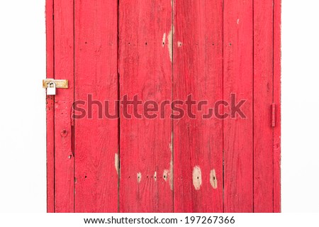 Old handmade red painted wooden door