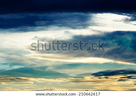 sky with dramatic clouds and sun light  on the wall texture