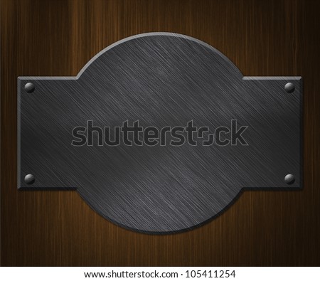Metal Plate on Wood Background