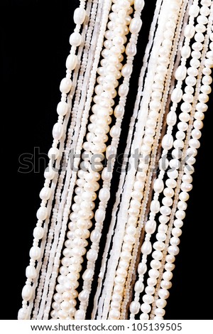 luxury jewelry pearl set necklace over black background