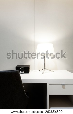 Workspace with desk lamp on home or studio
