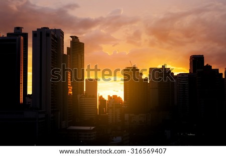 Sun rising over Bangkok city skyline, Cityscape sunset