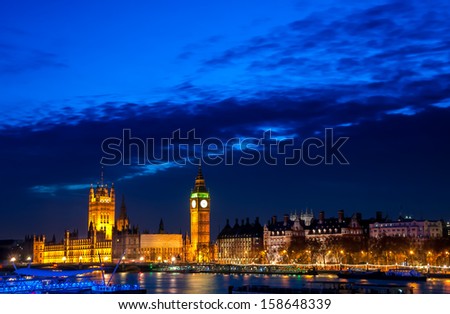 British parliament and the Big Ben tower by the river thames London.