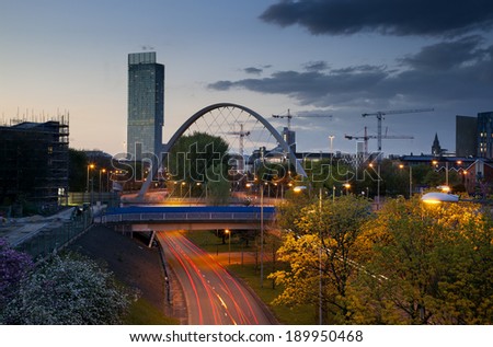 Beetham tower the tallest building in manchester and Hulme Arch bridge over princess road.