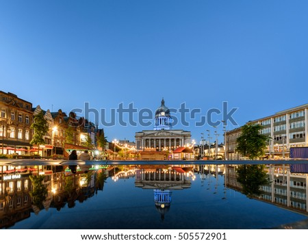 Nottingham market square with council house and new redevelopment pool with fountain in the square in Nottingham city, England.