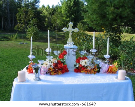 outdoor wedding altar set for ceremony with lawns and trees