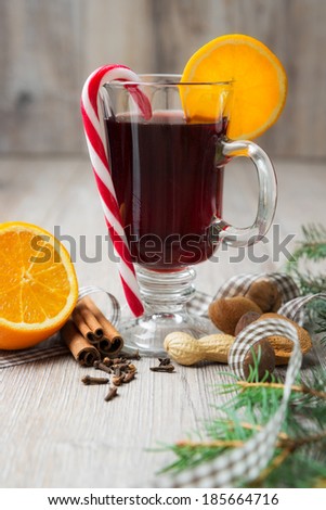 mulled wine with candy cone and christmas decoration