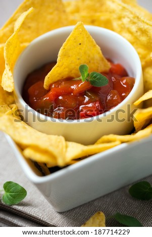 corn tortilla chips with hot salsa sauce