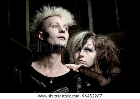outdoor portrait of a goth punk couple