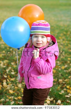 stock-photo-little-girl-with-two-helium-
