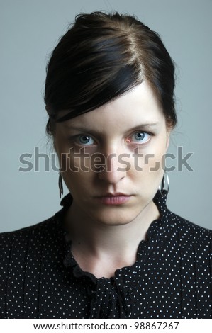 portrait of a serious looking woman