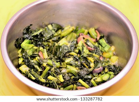 Cooked green vegetable in the container