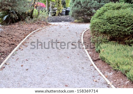 Beautiful walking path in the park in the fall