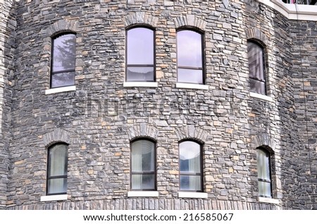 Detail of classic window on rock wall