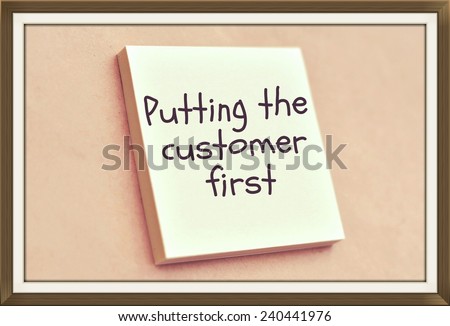 Text putting the customer first on the short note texture background