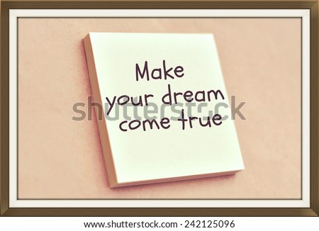 Text make your dream come true on the short note texture background