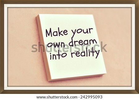 Text make your own dream into reality on the short note texture background