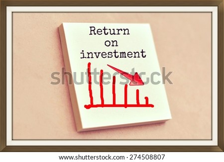 Text return on investment on the graph goes down on the short note texture background