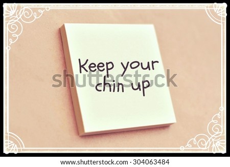 Text keep your chin up on the short note texture background