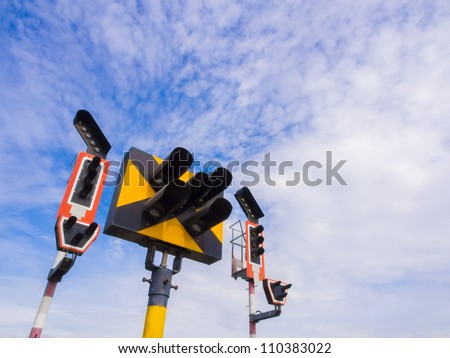 Train traffic light system with blue sky background