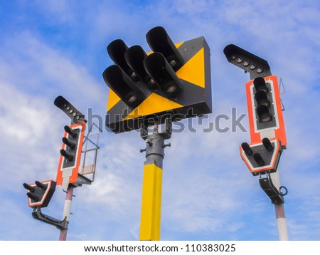 Train traffic light system with blue sky background