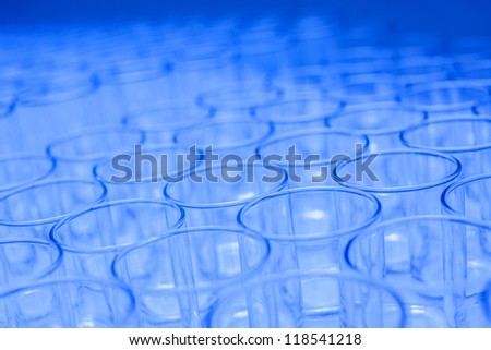 Blue water glasses arranged in orderly fashion for business meeting