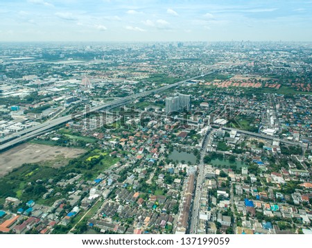 Bird eye view from private air craft, view of Bangkok crowded city