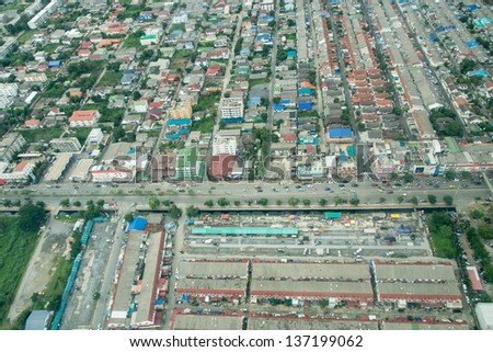 Bird eye view from private air craft, view of Bangkok crowded city