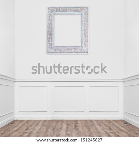 empty room with one frame hanging on the wall