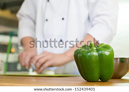 sweet pepper in the kitchen waiting to be chopped by chef. Selective focus