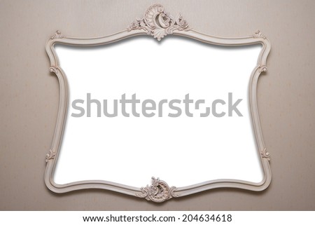 vintage photo frame with empty white space hanging on the wall