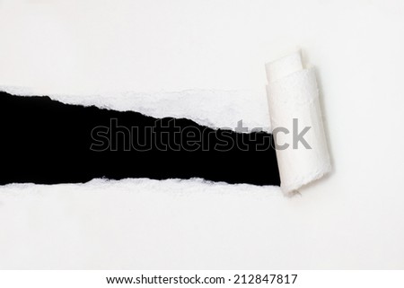 white paper torn off on black background