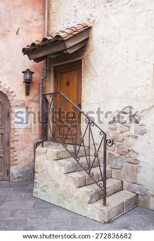 stair to entrance door of Italian style house