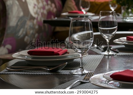 water glasses on table with other eating utensil