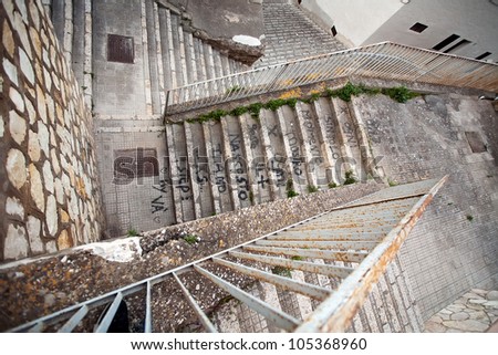 pattern of up and down stone staircases