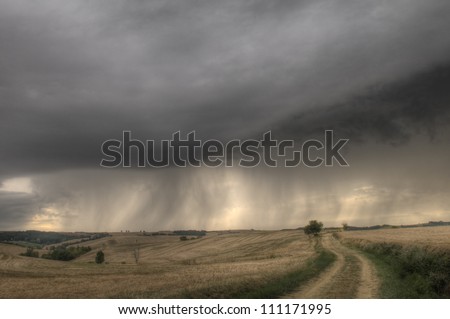changing stormy weather on french country on early evening