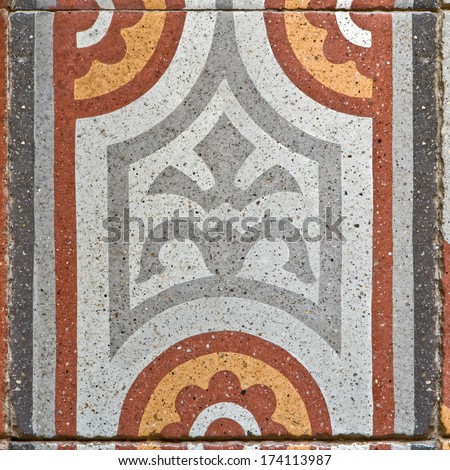 pattern on an ancient square paving tile