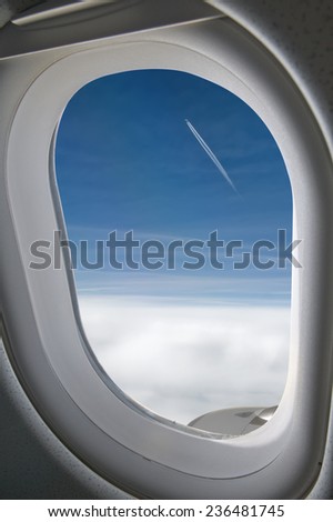 seeing a flying a big jet plane trough a big jet plane window