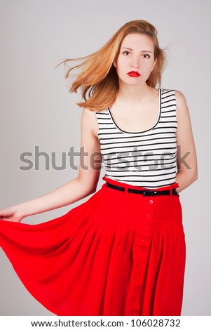 attractive lady in red skirt