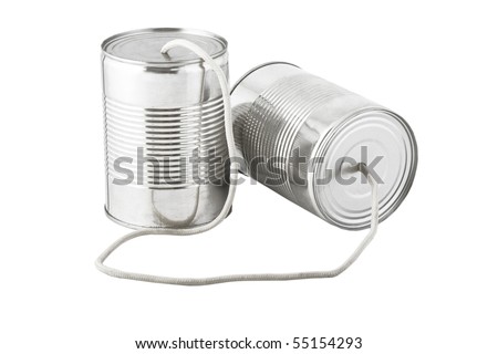 Closeup of tin cans telephone connected by string on white background, business communication concept