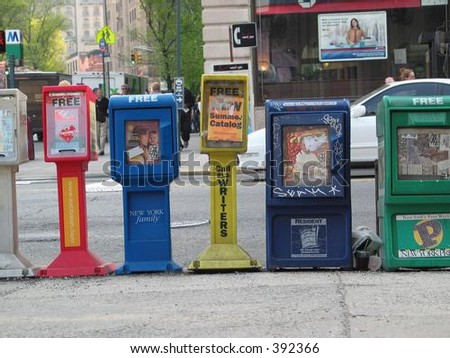 Newspaper stands on the street in NYC