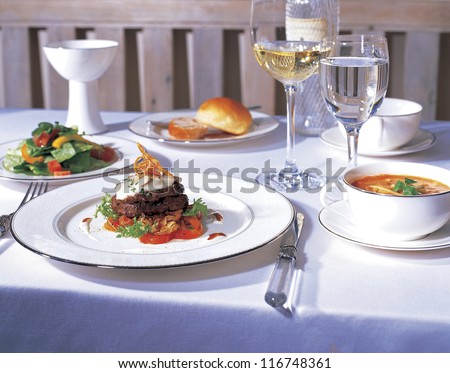 High angle view of a dining table with dishes and glasses