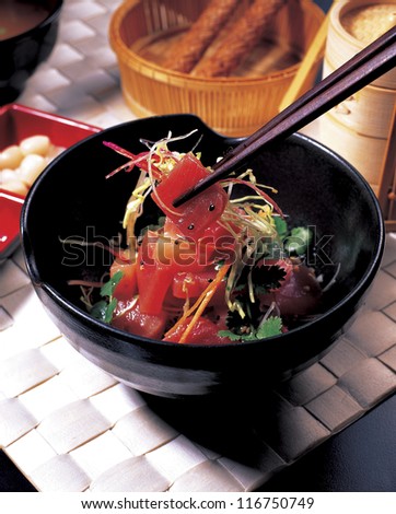 Japanese salad in a black bowl