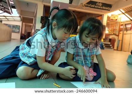 BANGKOK CITY, THAILAND - Dec 2014: In the dec 26, 2014. Bangkok County. Activity of teaching kindergarten.  Kindergarten students are learning. The students are fun and smiling happily.