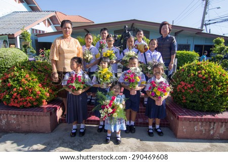 BANGKOK, THAILAND - June 11, 2015: Unknown children, A ceremony in which the entire student body pays homage to their teachers, at Elementary School. bangkok at 2015.