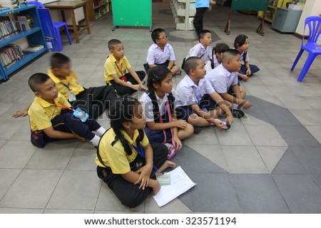 BANGKOK, THAILAND - SEP 18, 2015: Unknown children in Academic Activities day at Elementary School. Pieamsuwan school, Bangkok Thailand, Teachers teach students with television.