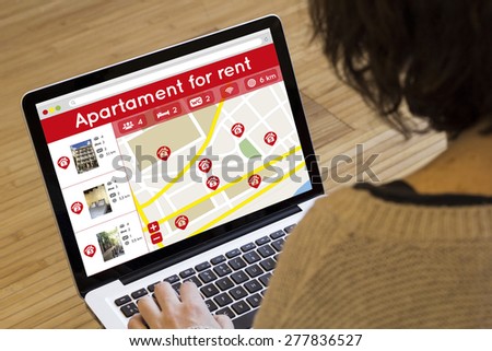 apartment search online concept: house search application on a laptop screen