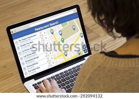 business search online concept: restaurant search engine on a laptop screen. All screen graphics are made up.