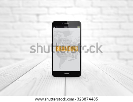 mobile branding on digital generated smart phone over wooden table. All screen graphics are made up.