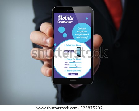 new technologies business concept: businessman hand holding a 3d generated touch phone with online mobile comparator on the screen. Screen graphics are made up.